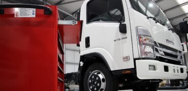 Isuzu truck in a maintenance bay