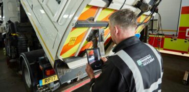 Technician maintaning a tipper