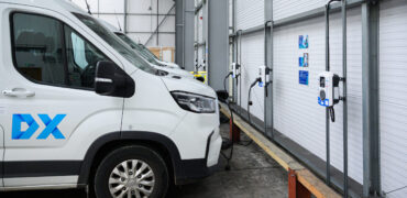 DX last mile delivery electric vans being charged