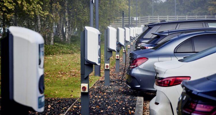 Parked electric cars being charged