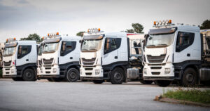 White trucks parked in a row