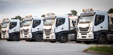 White trucks parked in a row