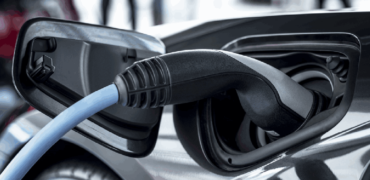 Electric car being charged