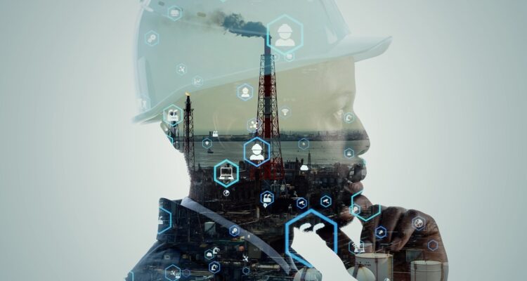 Worker wearing a hard hat superimposed on an industrial site