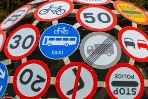 Road signs on a scupture