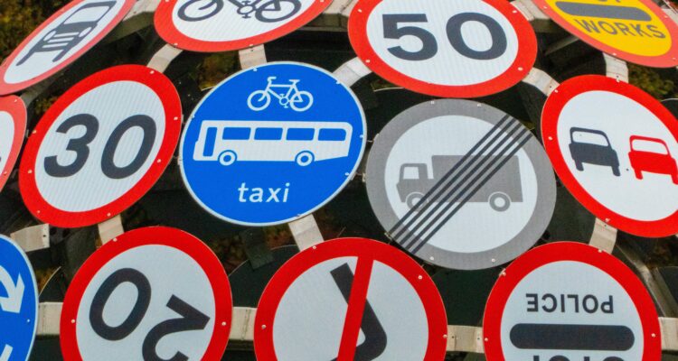 Road signs on a scupture