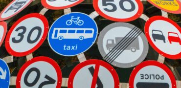 Road signs on a scupture