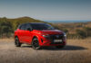New refreshed Qashqai 2024 in fuji sunset color parked beside the road in Faro, Portugal