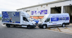 DA Techs' new and old vans