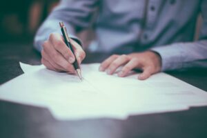 Man completing paperwork