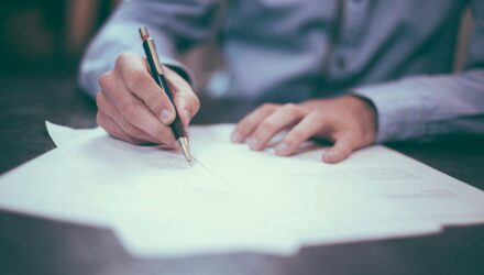 Man completing paperwork