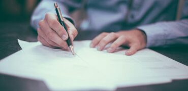 Man completing paperwork