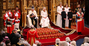 King preparing to give the King's Speeck in parliament