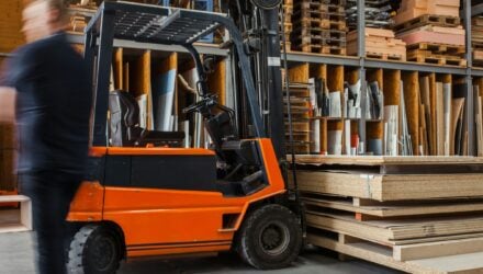 Fork-lift truck in a warehouse