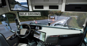 Self driving truck with head up display on a road. Inside view.