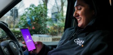 Wowan driver checking her mobile phone