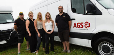 Hannah Pearson of Vanaways, centre. with members of the AGS Group team