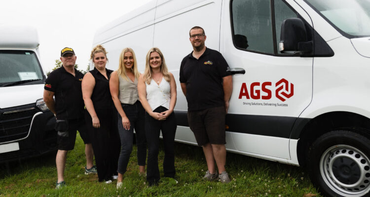 Hannah Pearson of Vanaways, centre. with members of the AGS Group team