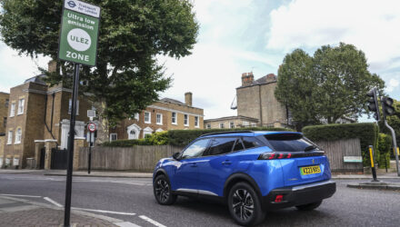 Blue Peugeot entering a ULEZ