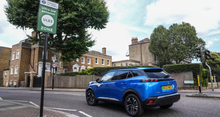 Blue Peugeot entering a ULEZ