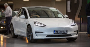 Tesla Model 3 going through an Aston Barclay auction