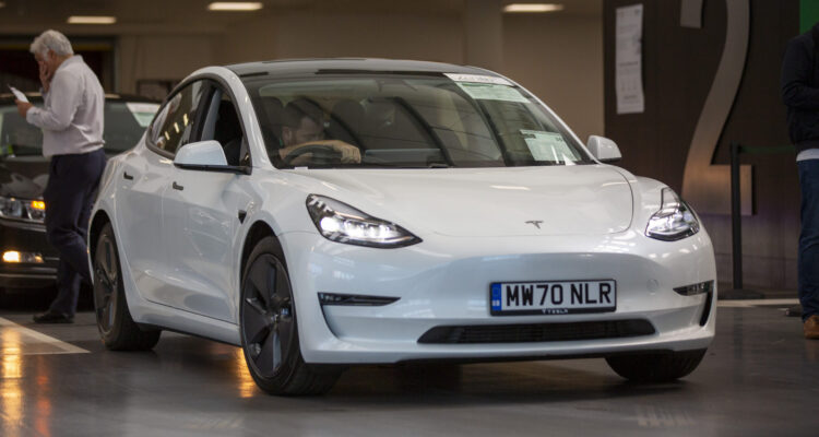 Tesla Model 3 going through an Aston Barclay auction