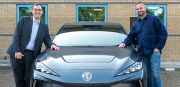Tom Gordon MP and Will Voisey on either side of an electric MG