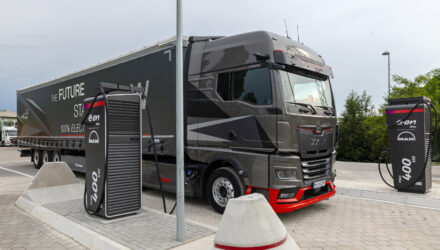 MAN electric truck next to an E.ON Drive charging point