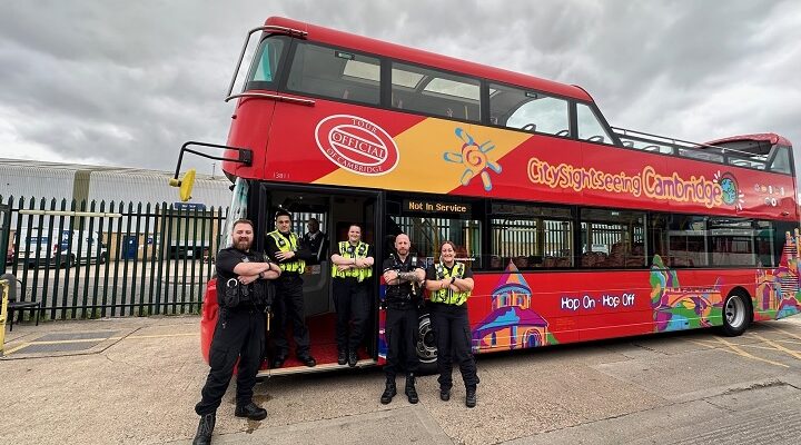 Cambridge police use a city tour bus to catch motorists using mobile phones