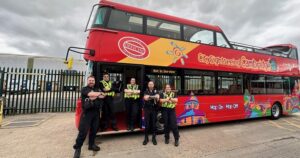 Cambridge police use a city tour bus to catch motorists using mobile phones