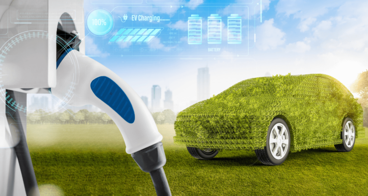 Green car at a charging point
