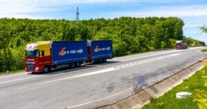 E. van Wijk Logistics DAF trucks on a country road