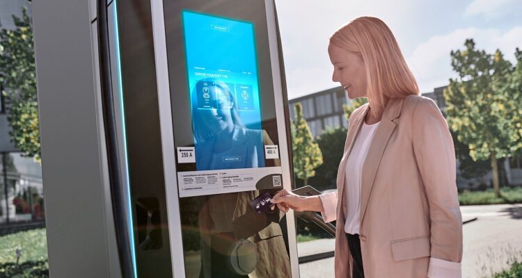 Woman using a charging station