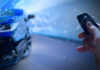 Car and person with key fob