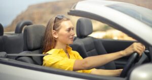 Young femail driver in her car