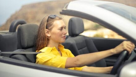 Young femail driver in her car