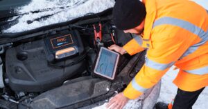 RAC mechanic checking a car battery