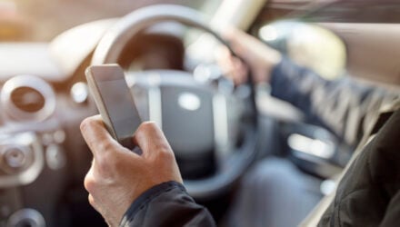 Texting while driving using cell phone in car