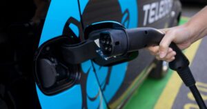 Electric fleet, EV Charging an electric car at a charge point infrastructure, EV Levy, zero emissions