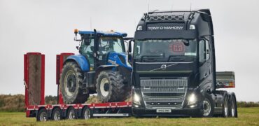 Volvo truck with a tractor on a low-loader