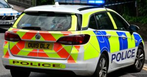 Police car with blue flashing lights