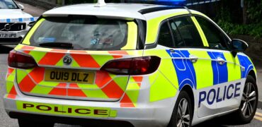 Police car with blue flashing lights