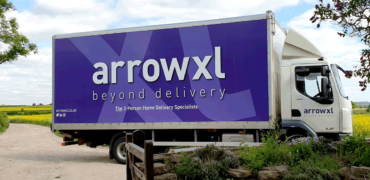 ArrowXL truck parked outside a house