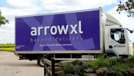 ArrowXL truck parked outside a house