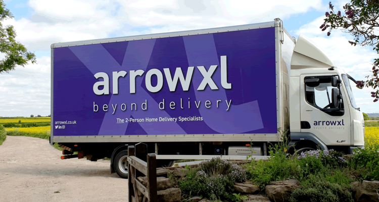 ArrowXL truck parked outside a house