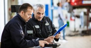 Fleet managers checking documentation