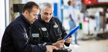 Fleet managers checking documentation