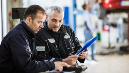 Fleet managers checking documentation