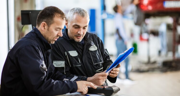 Fleet managers checking documentation