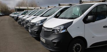 A row of white vans